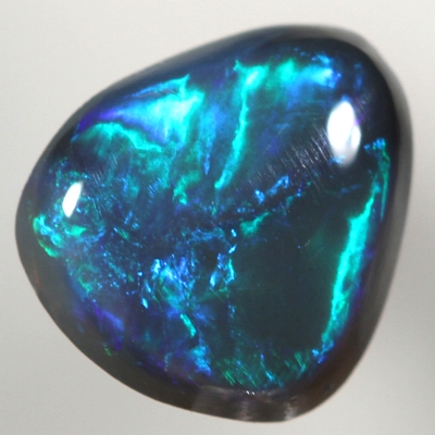 SOLID BLACK OPAL Bright golden green in a Flame pattern